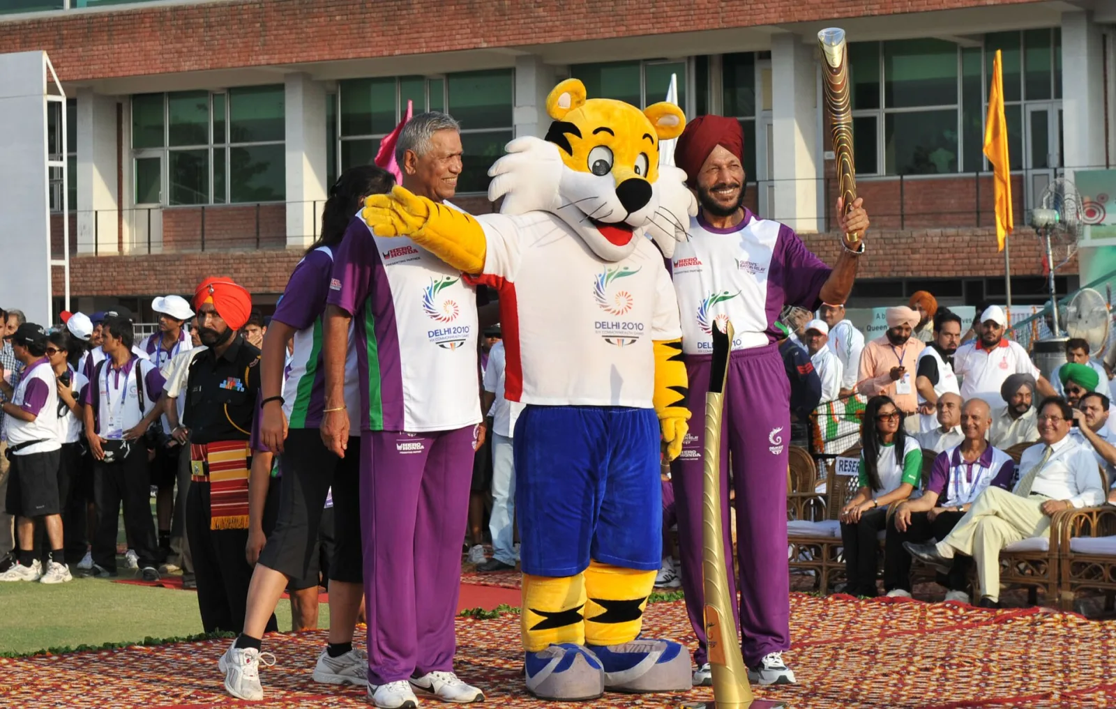 The Veteran Athletes, Shri Milkha Singh and Shri G.S. Virithi with the Queen's Baton Delhi 2010 and Shera, the Mascot of Commonwealth Games Delhi 2010, in Chandigarh on July 03, 2010