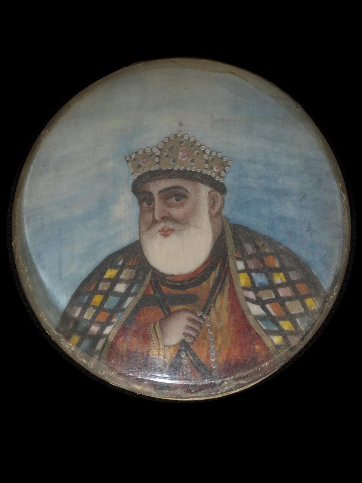 Painting, paint on ivory, a miniature portrait of Guru Nanak.