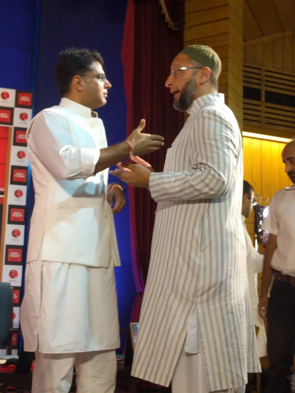 Asaduddin Owaisi (right) with Sachin Pilot during the book launch of Rajdeep Sardesai's book Newsman